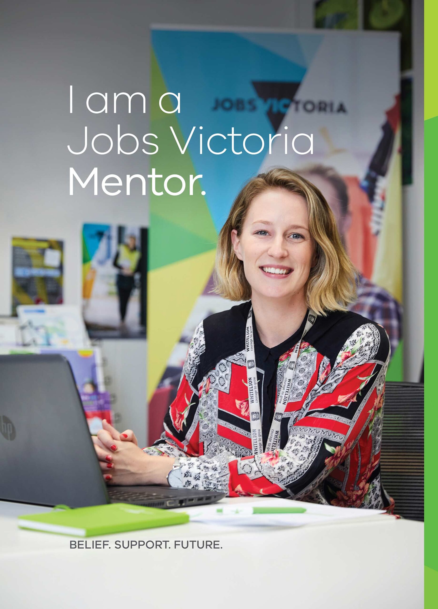 A Jobs Victoria Mentor, working at her desk in Melbourne