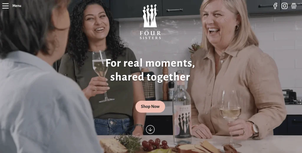 A wide, horizontal website hero banner crop featuring two women laughing, optimized for the 4 Sisters digital platform from their recent hybrid shoots.